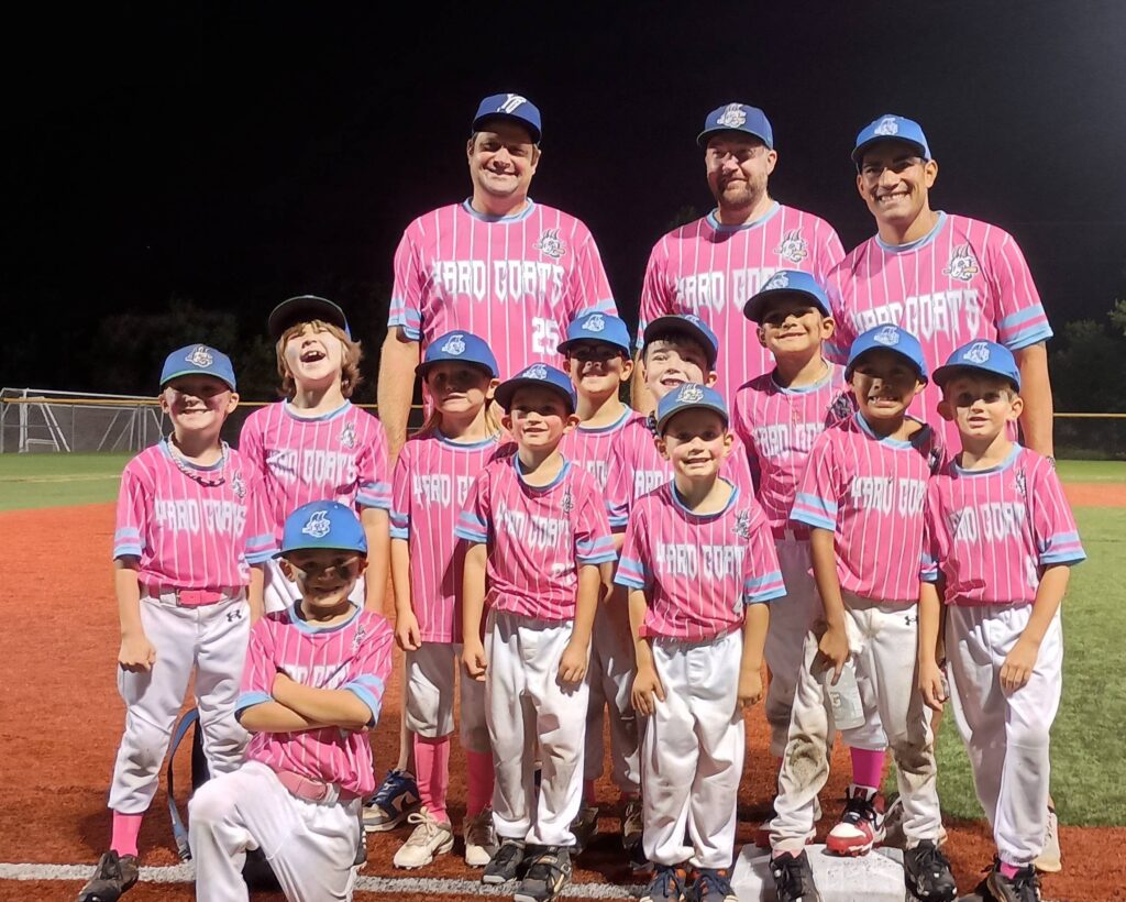 Youth baseball team in pink jerseys